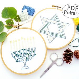 May include: Two embroidery hoop patterns, one with a blue and green Star of David and the other with a blue menorah with green leaves and yellow candles.  PDF Pattern.