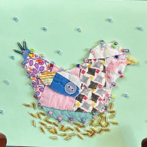 May include: A white ceramic mug with a black handle and the text "But First, Coffee" in a black, handwritten-style font. The mug is on a white surface.