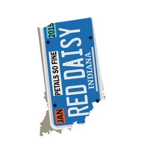 May include: A blue Indiana license plate with the text "RED DAISY" and "PETALS SO FINE" in white lettering. The plate has a white border and a black background with the year "2013" in white lettering. The plate is shaped like the state of Indiana.