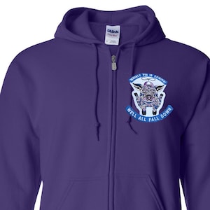 May include: A purple zip-up hoodie with a hood and front pockets. The hoodie features a graphic on the chest with a pig illustration and the text "Whirly Pig is Coming" and "Well All Fall Down" in a blue banner.