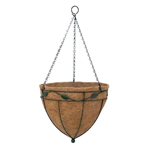 May include: A brown coir hanging planter with a black metal frame and chain. The planter has a decorative green leaf design.