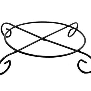 May include: Black metal plant stand with a round base and three legs with decorative swirls.