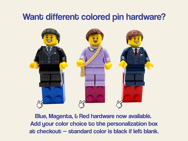 May include: Three LEGO minifigures standing on blue, magenta, and red bricks. Text reads: Want different colored pin hardware? Blue, Magenta, & Red hardware now available. Add your color choice to the personalization box at checkout &ndash; standard color is black if left blank.