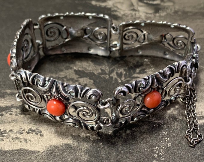 Coral silver bracelet round coral cabochons. 18cm length Rococo revival decorated panels with scrolls and swirls antique 835 German silver