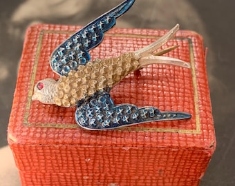 Antique silver swallow brooch in flight with antique box. circa early 20th century