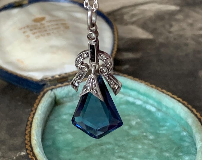 Art Deco silver paste sapphire articulated pendant with diamond terminated cut stone on a fine silver chain