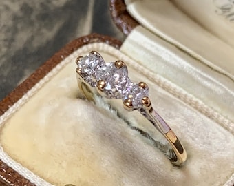 Diamond trilogy ring. 0.4 carat 18ct Gold and platinum. Clarity VVS 2 Vintage brilliant cut natural diamonds. Ring size L 1/2