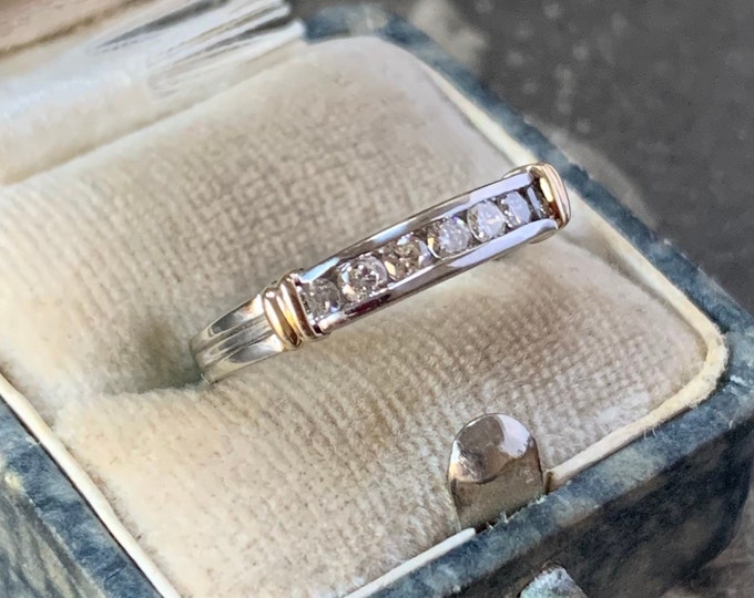 0.25tcw Diamond gold ring. 7 sparkling diamonds. Size L, size 5.5 US. 9ct white gold with English hallmarks