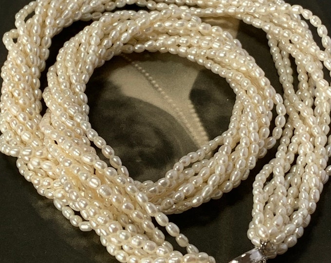1000 pearls 10 strand necklace. 24 inches Matinee length 1000 freshwater pearls. 1960s Mikado Pearls, Tokyo, original packaging