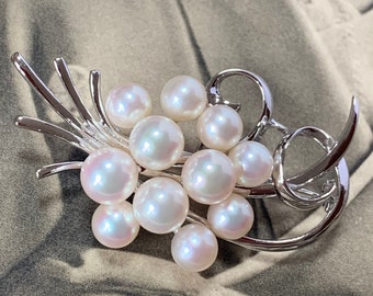 Vintage Mikimoto Pearl brooch. Silver set with 11 fabulous Japanese Akoya Pearls