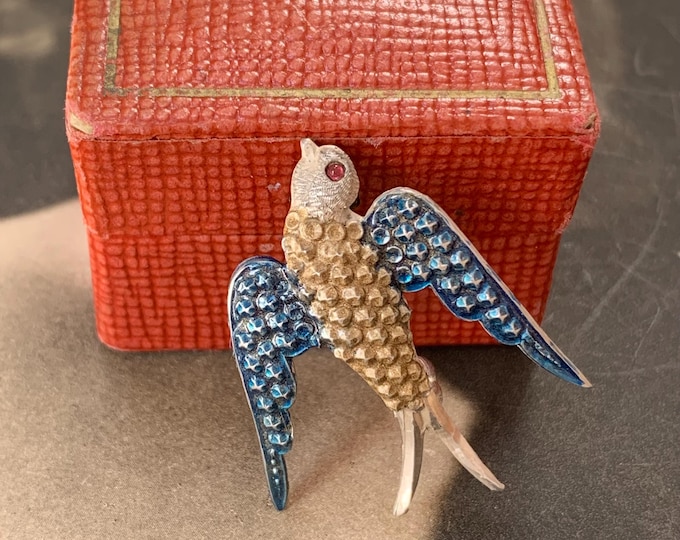 Antique silver swallow brooch in flight with antique box. circa early 20th century