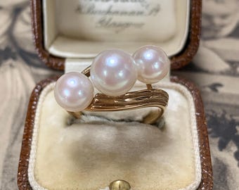 Vintage Mikimoto Akoya Pearl Ring: 9ct Gold Trilogy Bypass Design with 7mm AAA pearls