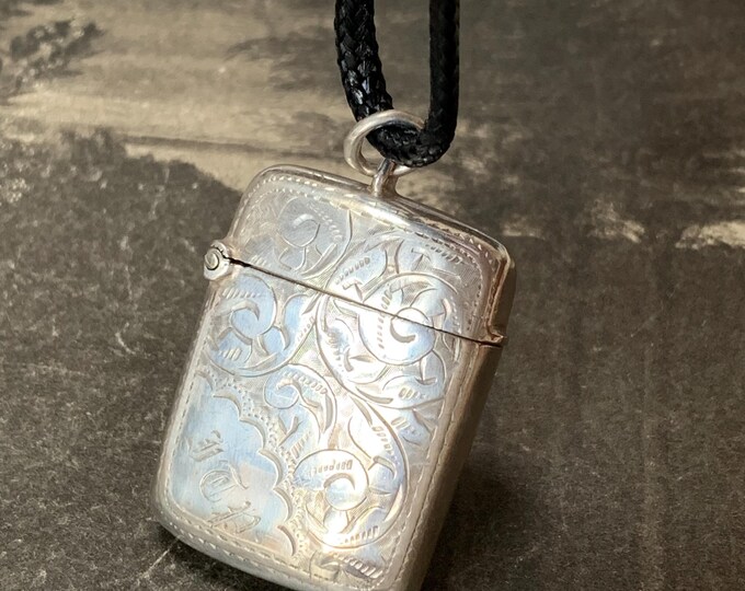 1898 Vesta case pendant Locket for chain or leather strap. Birmingham Hallmark , 19.8 grams. Fern engraving with hinged lid 17 inch necklace