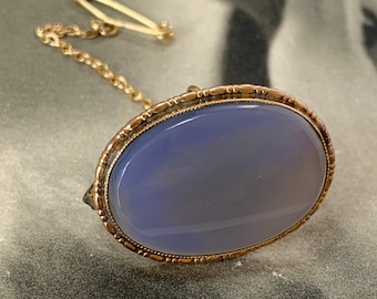 Victorian chalcedony brooch. 9ct yellow gold set Blue gemstone delicate beaded detail mount and safty chain