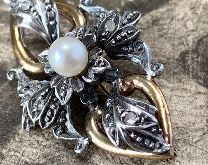 Antique Diamond and pearl brooch. 18ct yellow gold and silver set with mine cut diamonds and a central pearl. 5 grams