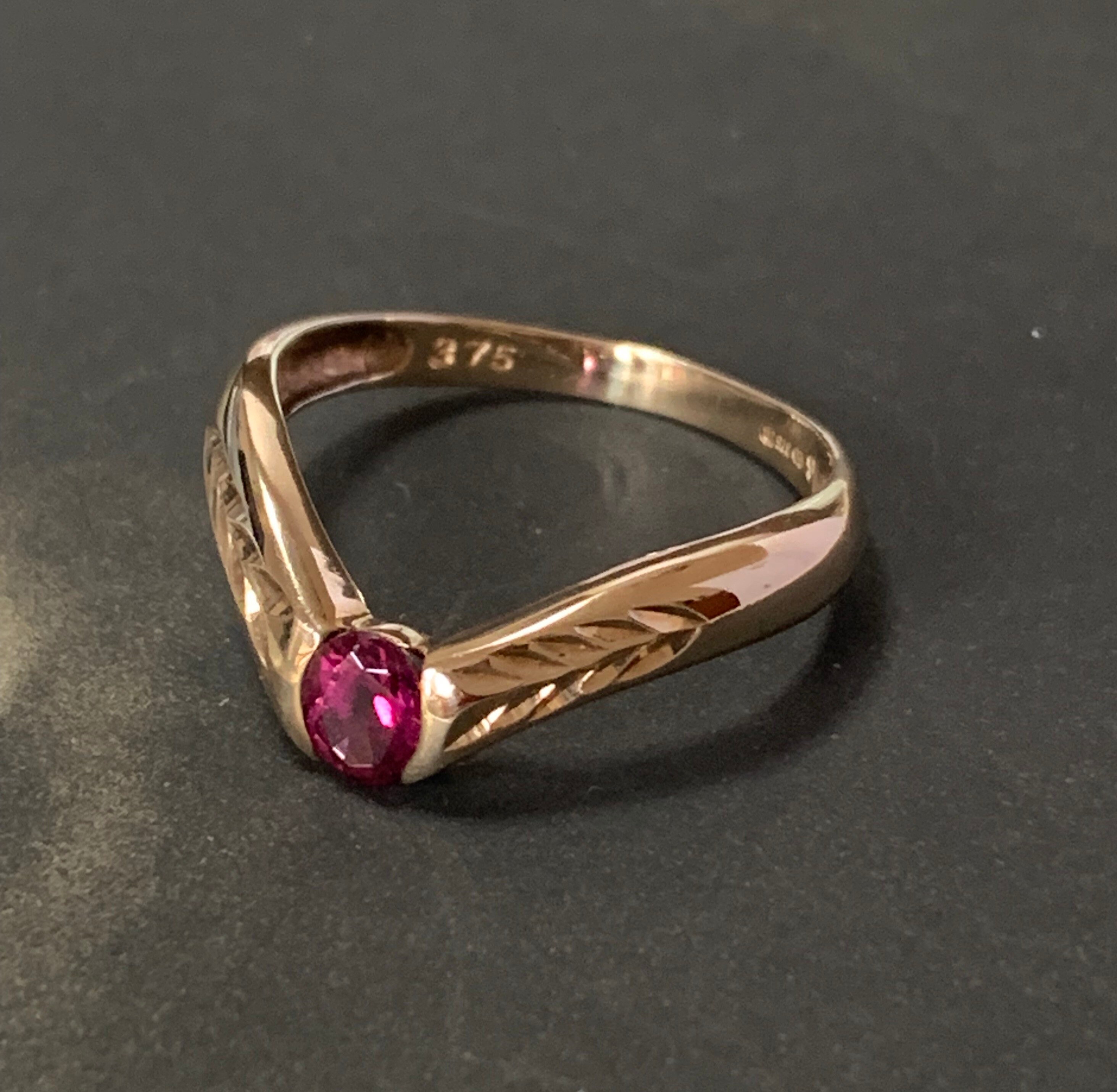 Vintage Wishbone Gold Ring Showcases A Timeless Design, Expertly Crafted in 9Ct With Captivating Oval Facet Cut Pink Tourmaline