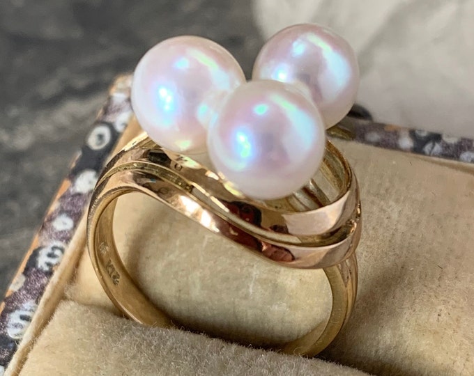 Mikimoto 7mm Akoya Pearl Ring. 14ct gold trilogy ring  5 grams Size  L 1/2, size 6 (US) Three beautiful 6mm - 7mm AAA akoya pearls