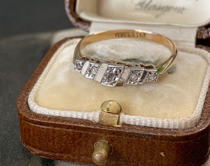 Diamond Ring. 18ct gold and Platinum set with 5 old cut diamonds. Ring size N (UK) size 6.5 (US)