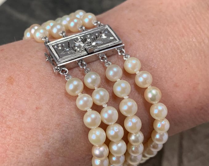 Vintage 1950s 4 row pearl bracelet. 5mm Akoya pearl bracelet 140 cultured pearls Sterling silver clasp. 19cm long