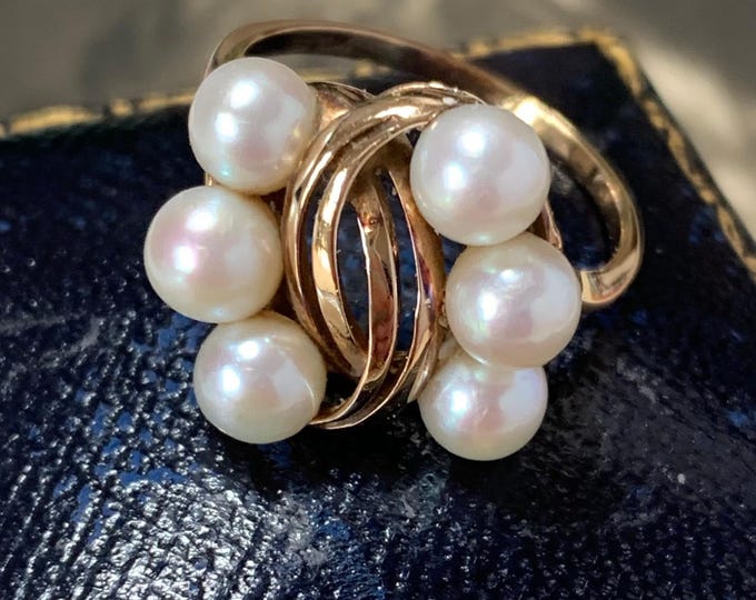 Vintage Mikimoto pearl ring. 6mm gem quality akoya pearls in 14ct gold .Ring size Q size 8 (US)