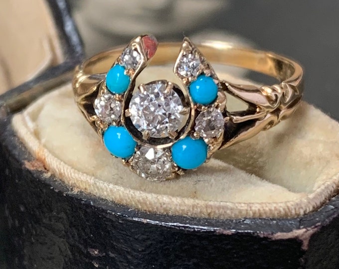 0.7ct diamond ring | 18ct gold horseshoe ring |  diamonds and turquoise gemstones | Ring size Q size 8 (US) | 4.6 grams | Hallmark