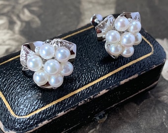 Vintage pearl screw back earrings, Silver set akoya pearls in a petal design. Beautiful casual or formal wear