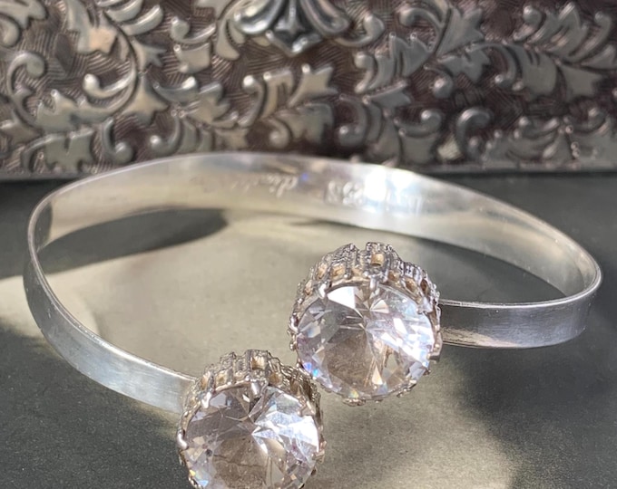 1960s Ake Linstrom Silver Bangle. Made for Bengt Hallberg Sweden. 2 Round faceted crystals in a vintage torque bangle