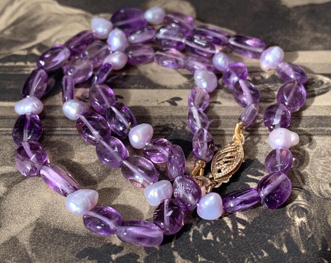 Amethyst gemstone and pearl necklace. Princess length 17 inches. 6mm baroque freshwater pearls. 9ct gold clasp