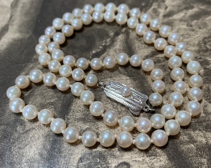 Mikimoto 19 inch Pearl Necklace.  Princess length akoya pearl necklace with silver and pearl clasp