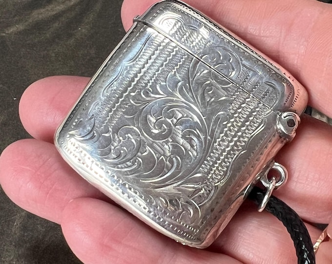 1904 Silver vesta case pendant with 20 inch corded strap necklace. Full English hallmark 25 grams