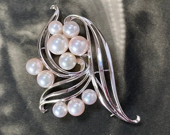Mikimoto pearl brooch made from silver and set with 10 AAA gem quality Pearls