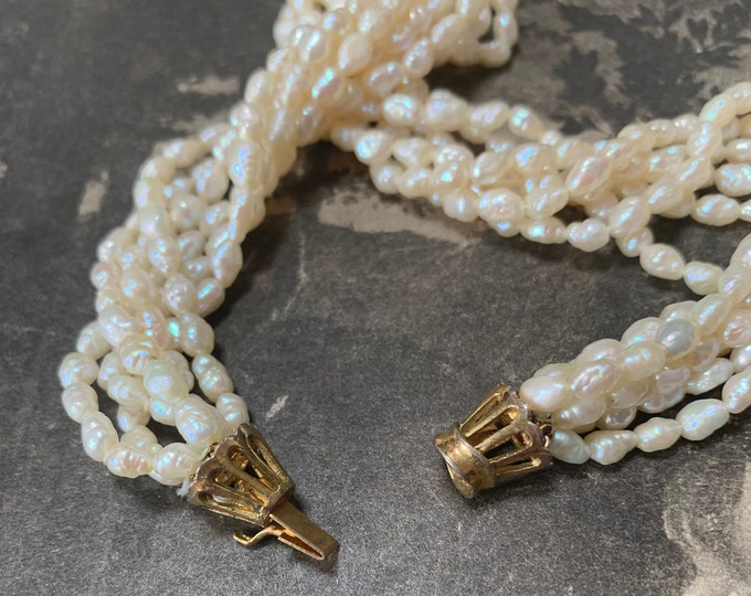 Princess length pearl necklace comprising 6 beautiful strands and a length of 45cm. Vintage freshwater pearl necklace.