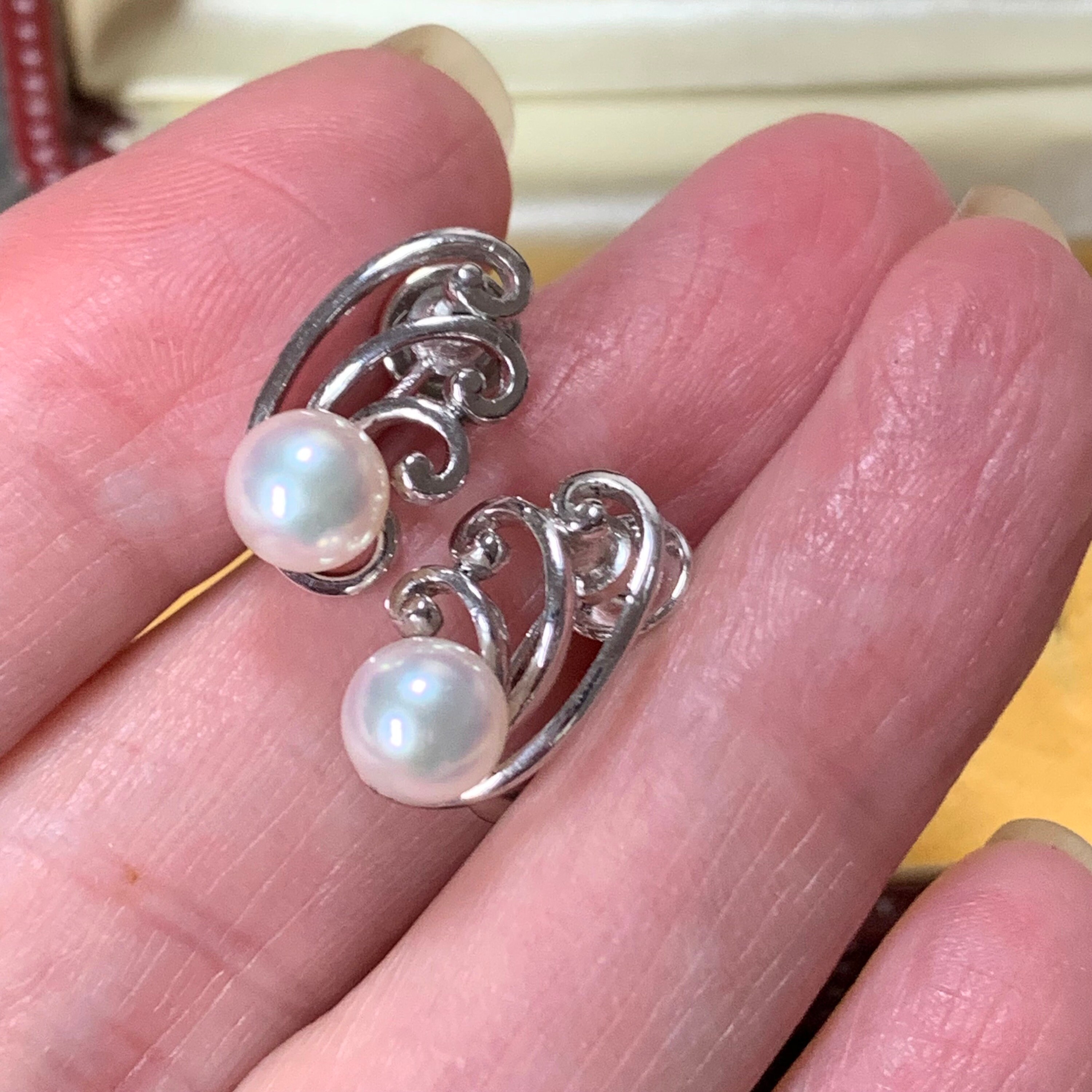 Mikimoto rolling wave pearl earrings. 6.5 mm akoya pearls in