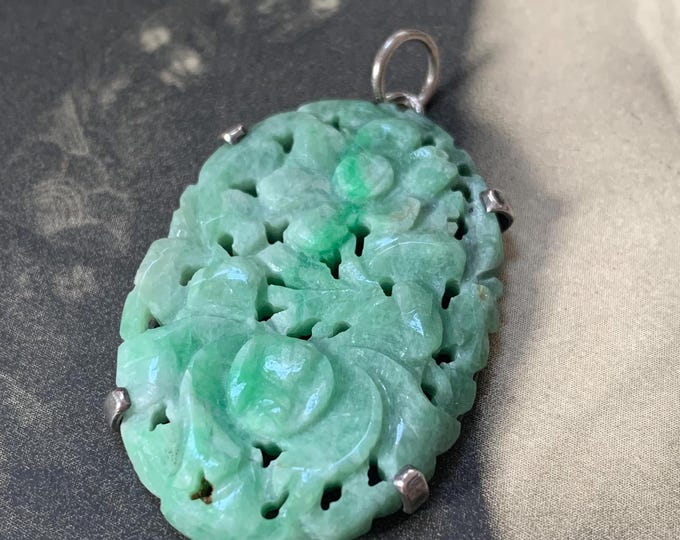 Quing dynasty green jade pendant.  Edwardian silver set carved jade with flowers. For chain or strap