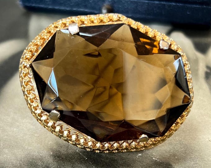 Vintage Paste Smokey Quartz Dress Brooch in gold gilt metal with large octagonal brown stone circa 1970s. 26 grams