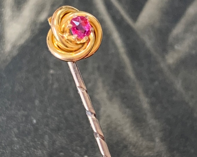Natural ruby brooch pin. Edwardian 15ct Gold Antique Lovers knot with central ruby