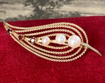 1960s Mikimoto 9ct Gold Pearl brooch. Garnets and pearls in a leaf design  with vintage Mikimoto Box. London hallmarks