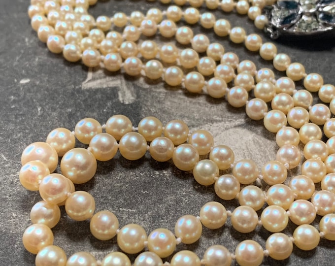 Matinee length akoya Pearl Double Strand Necklace. Art deco Silver Paste Sapphire and Paste Diamond set Clasp