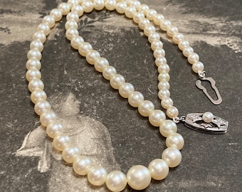 Mikimoto 4mm- 8mm Pearl Necklace. Large Akoya pearl choker length strand for casual wear or formal wear