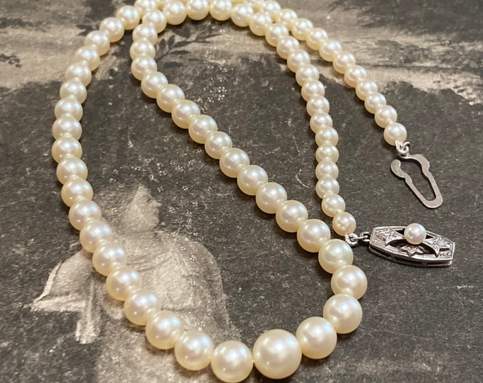 Mikimoto 4mm- 8mm Pearl Necklace. Large Akoya pearl choker length strand for casual wear or formal wear