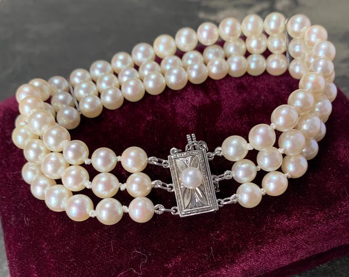 Mikimoto 3 strand pearl bracelet. 17cm long 5.5mm akoya pearls with silver clasp and Mikimoto velvet box. Beautiful