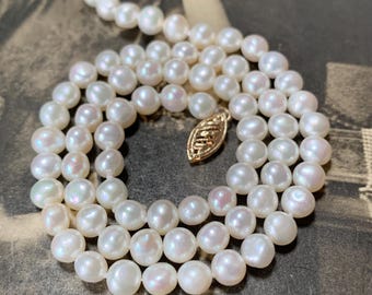 41 cm Princess length pearl necklace with 73 baroque pearsl 9ct gold clasp. 5.5mm quality pearls hand re- strung
