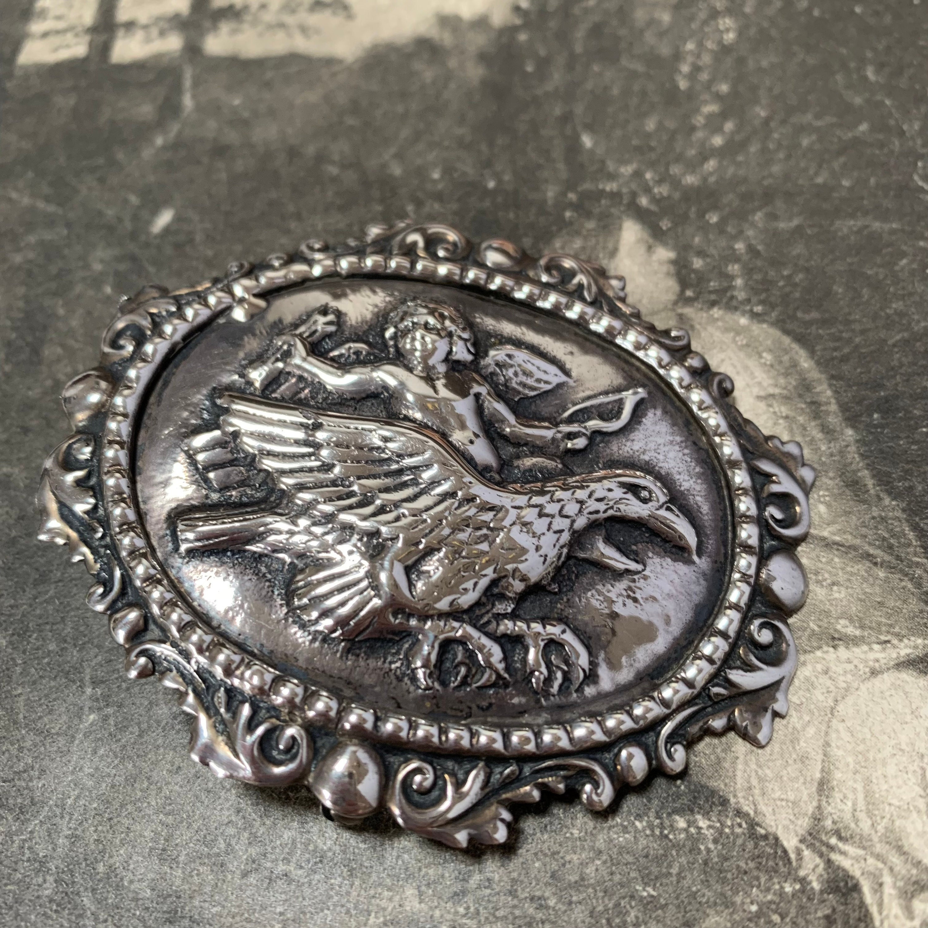 Victorian Silver Brooch Depicting Cupid Riding On An Eagle By Danish Artist Christen Kobke