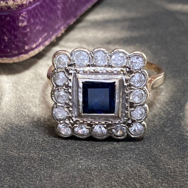 Mid century cocktail ring. Made in England this beautiful 9ct gold ring is set with blue and white spinels with full London hallmarks