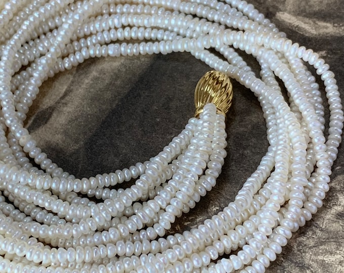 Biwa pearl necklace Princess length 8 strands 9ct gold clasp Freshwater pearls 17-19 inches long Formal or casual wear. 1980s classic look