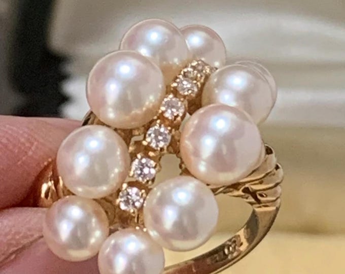 1985 Mikimoto pearl ring  18ct gold 10 AAA akoya pearls  7 diamonds  London hallmark  Ring size O size 7 (US) 7.5 grams