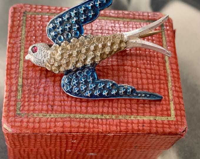 Antique silver swallow brooch in flight with antique box. circa early 20th century