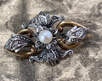 Antique diamond and pearl brooch. 18ct yellow gold and silver set with mine cut diamonds and a central pearl