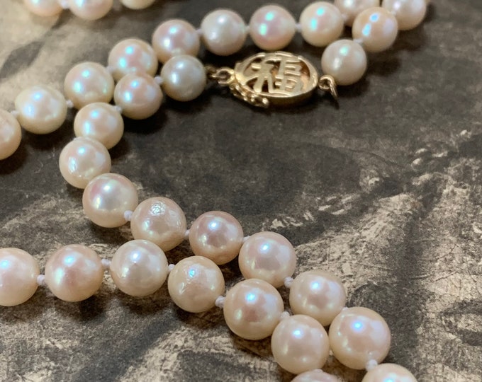 Akoya pearl necklace 14ct yellow Gold clasp. Vintage pearl strand and gold Clasp features Chinese Blessing motif