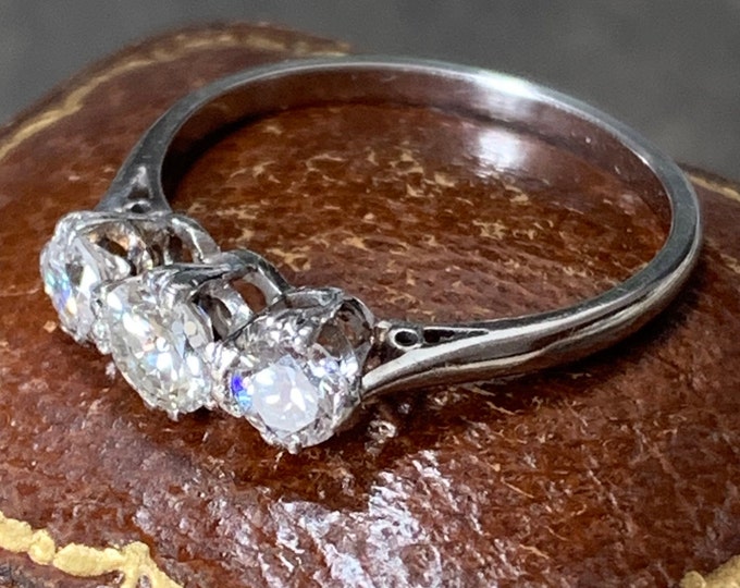 Antique Platinum Trilogy Diamond Ring: 0.70 TCW, VVS1 Clarity, Size 6 US